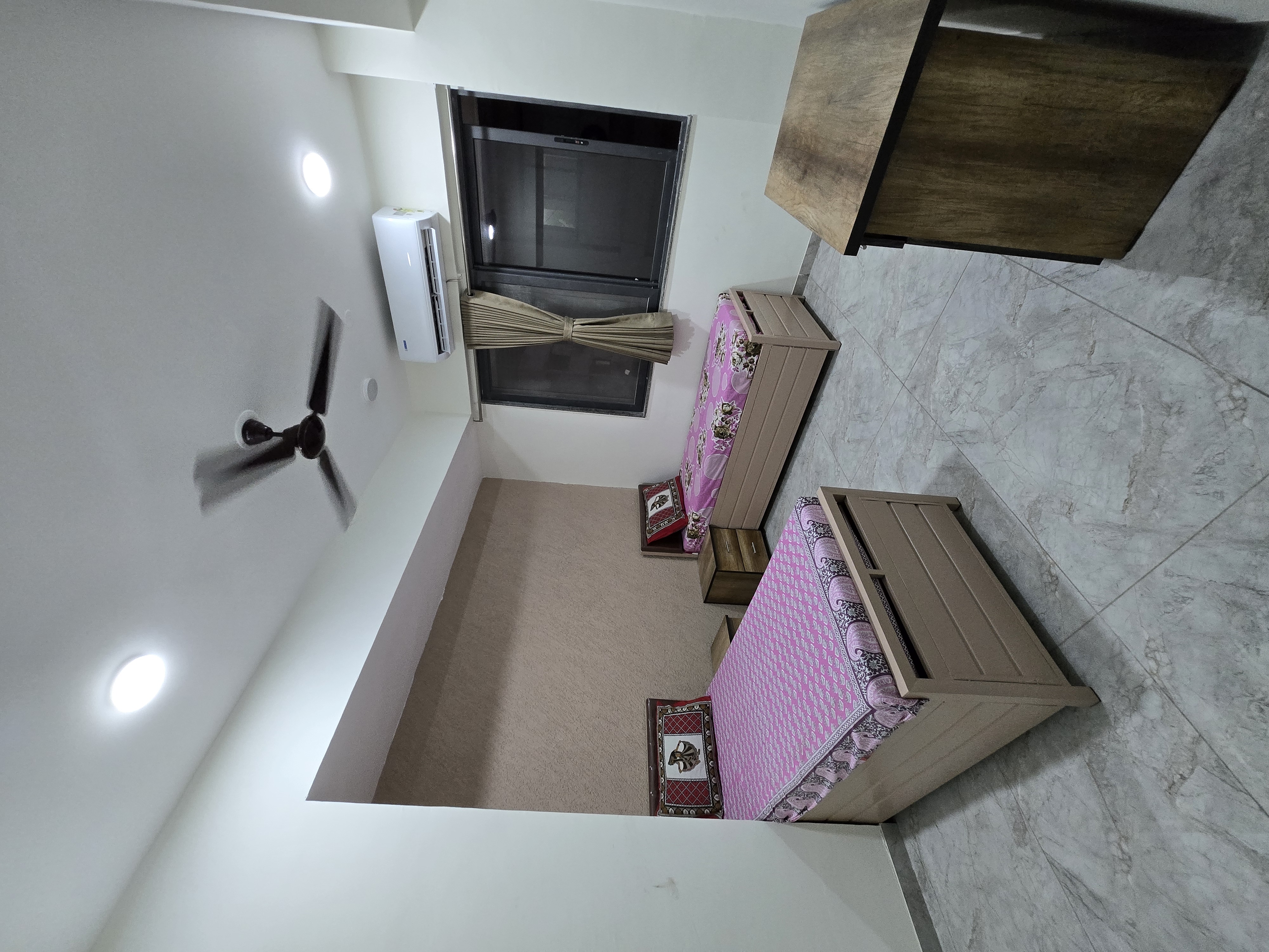 Double sharing room interior at Mansarovar Girls PG, Navrangpura, Ahmedabad