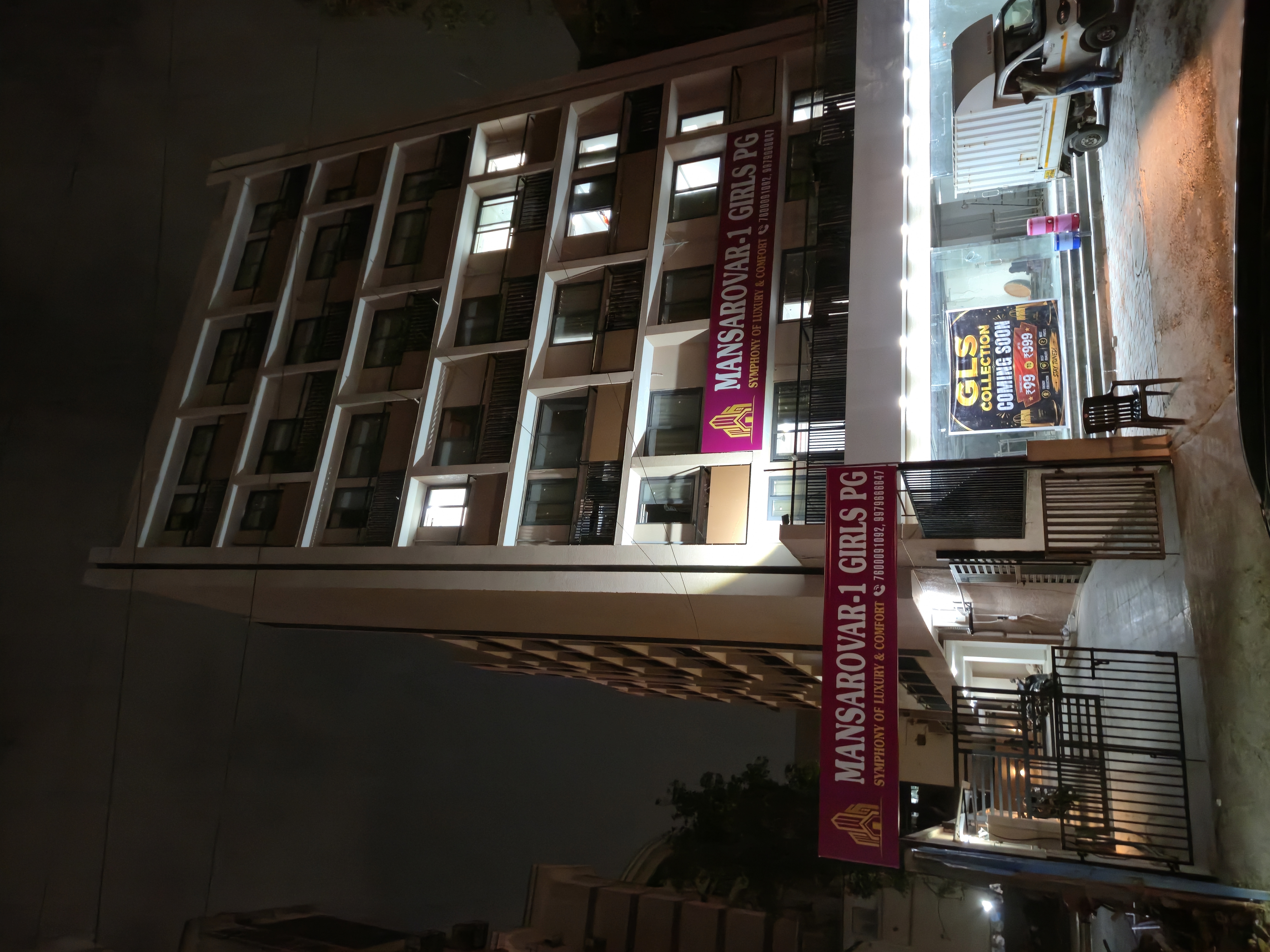 Mansarovar Girls PG building exterior on C.G. Road, opposite GLS University, Navrangpura, Ahmedabad