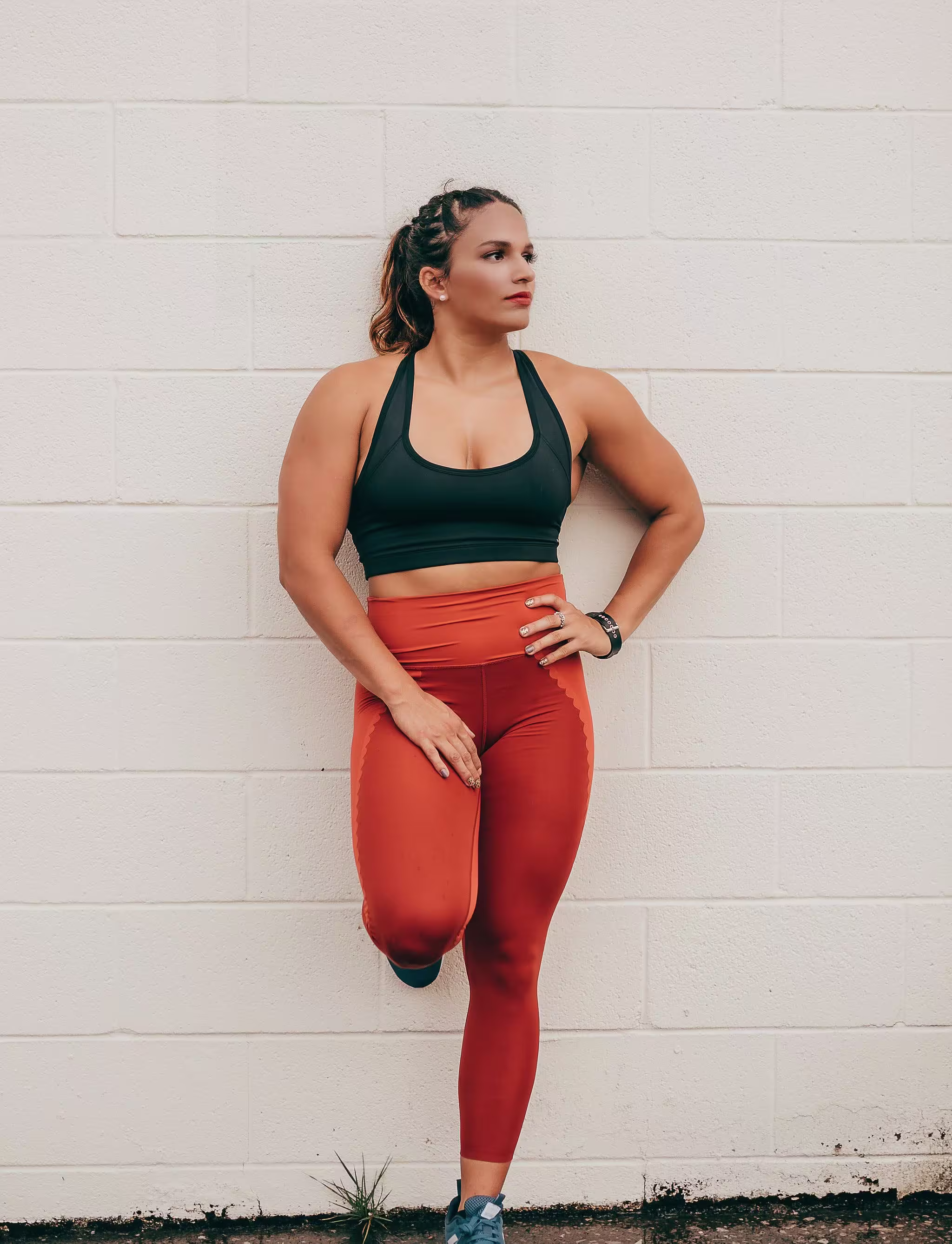 Stephanie doing lunges in a field