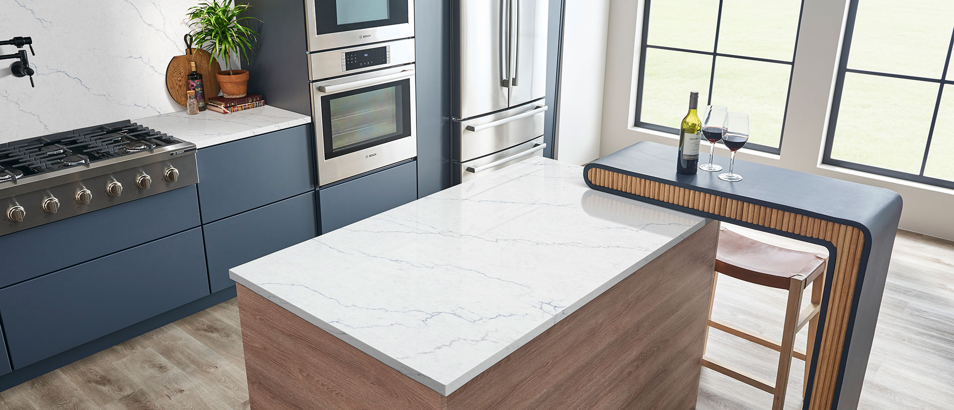Calacatta Miraggio Cielo Quartz Countertop in Kitchen Island
