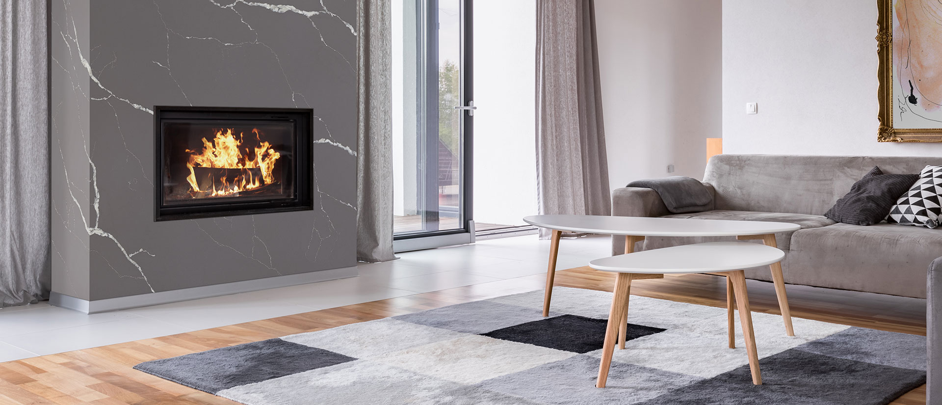 Calacatta Laza Grigio Quartz Accent Wall in Living Room