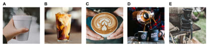 A. Coffee held in a Styrofoam cup B. A glass of iced coffee swirled with cream C. Barista-prepared coffee with foam design D. Slow brew poured into two mugs E. Cast-iron coffee grinder