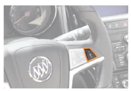 picture of a steering wheel with the volume control highlighted