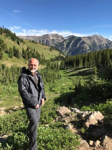 Photo of Nigel Bevans in an expansive nature setting