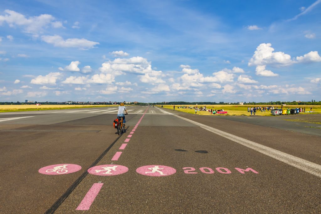 Bike rider on runway