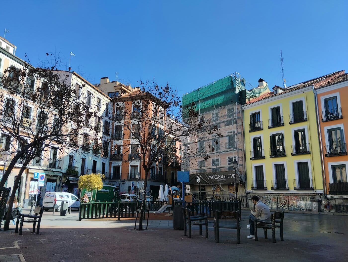 A street and buildings in the Malasana neighborhood of Madrid