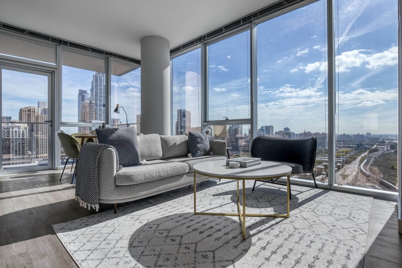 Bright living room in Chicago apartment with lots of sunlight