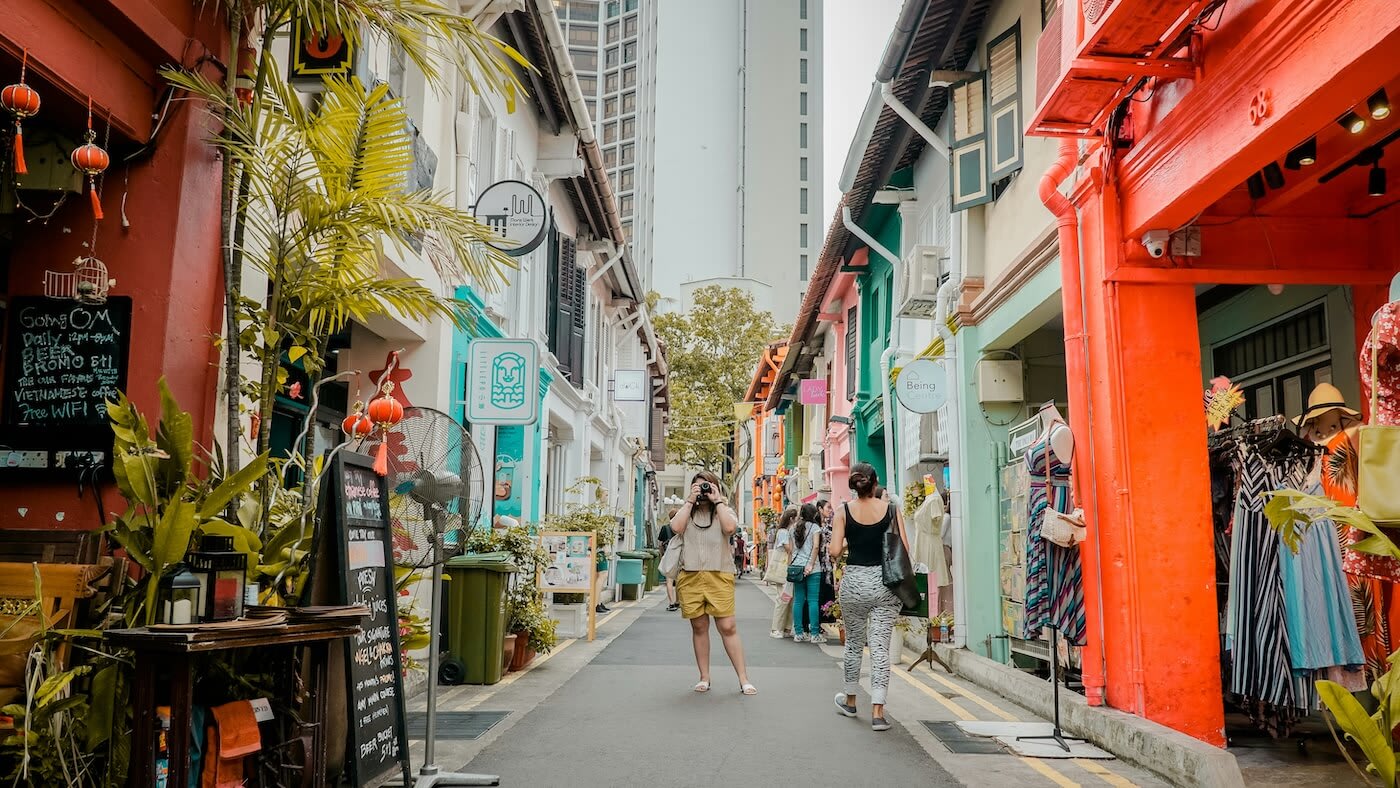 A colorful street with shops in Singapore