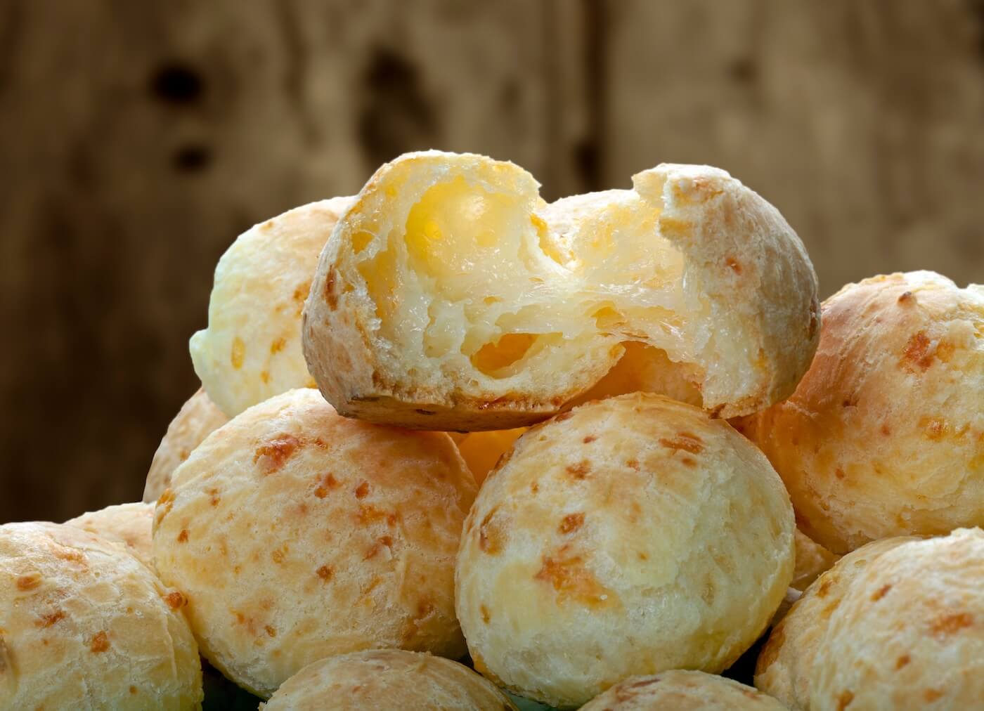 Pão de queijo cheese bread pulling apart