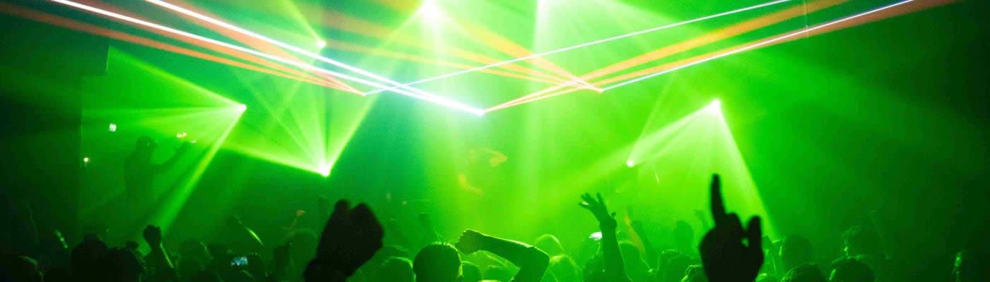 Green lights show in a club