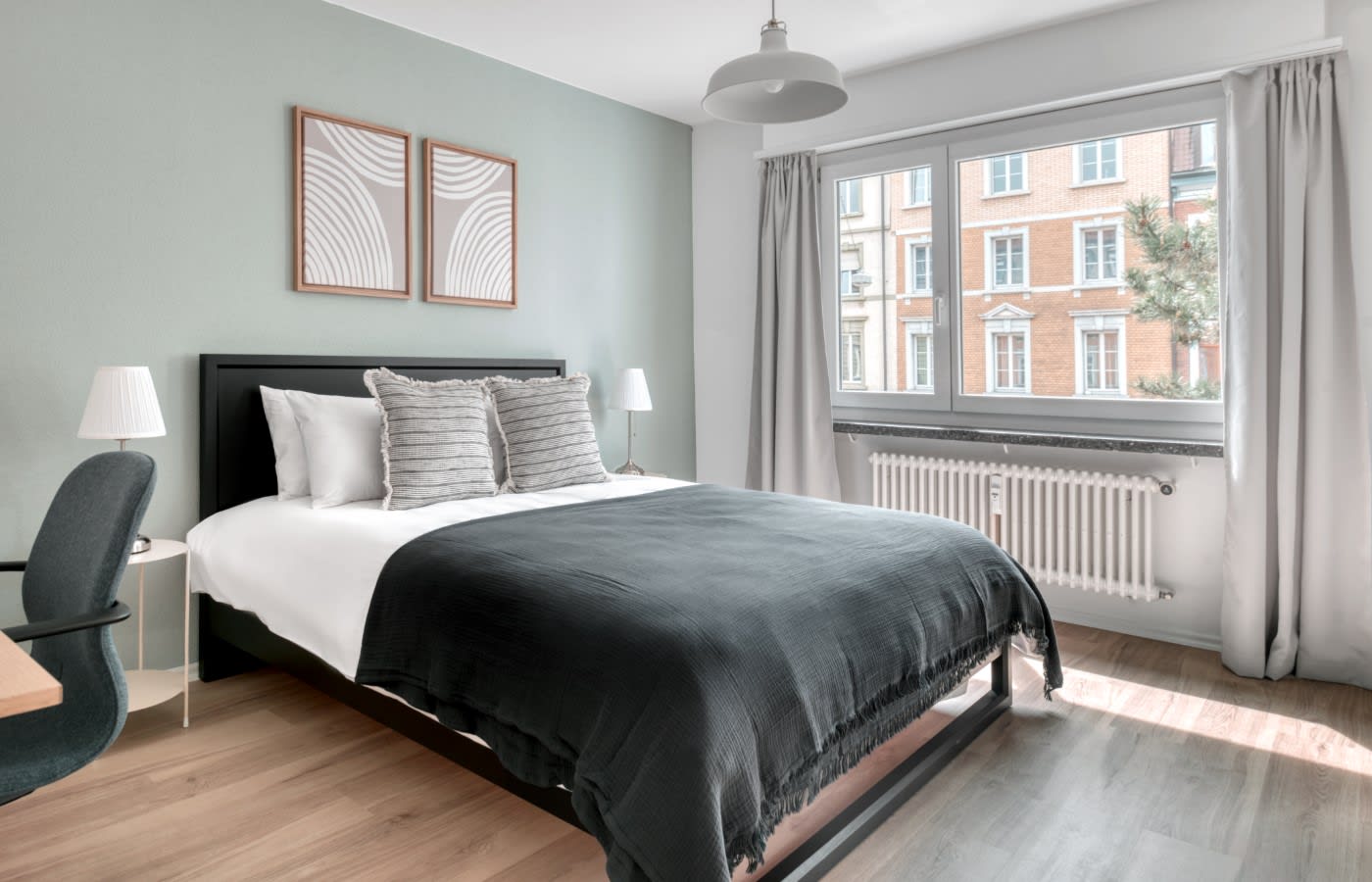 furnished bedroom in a Basel apartment