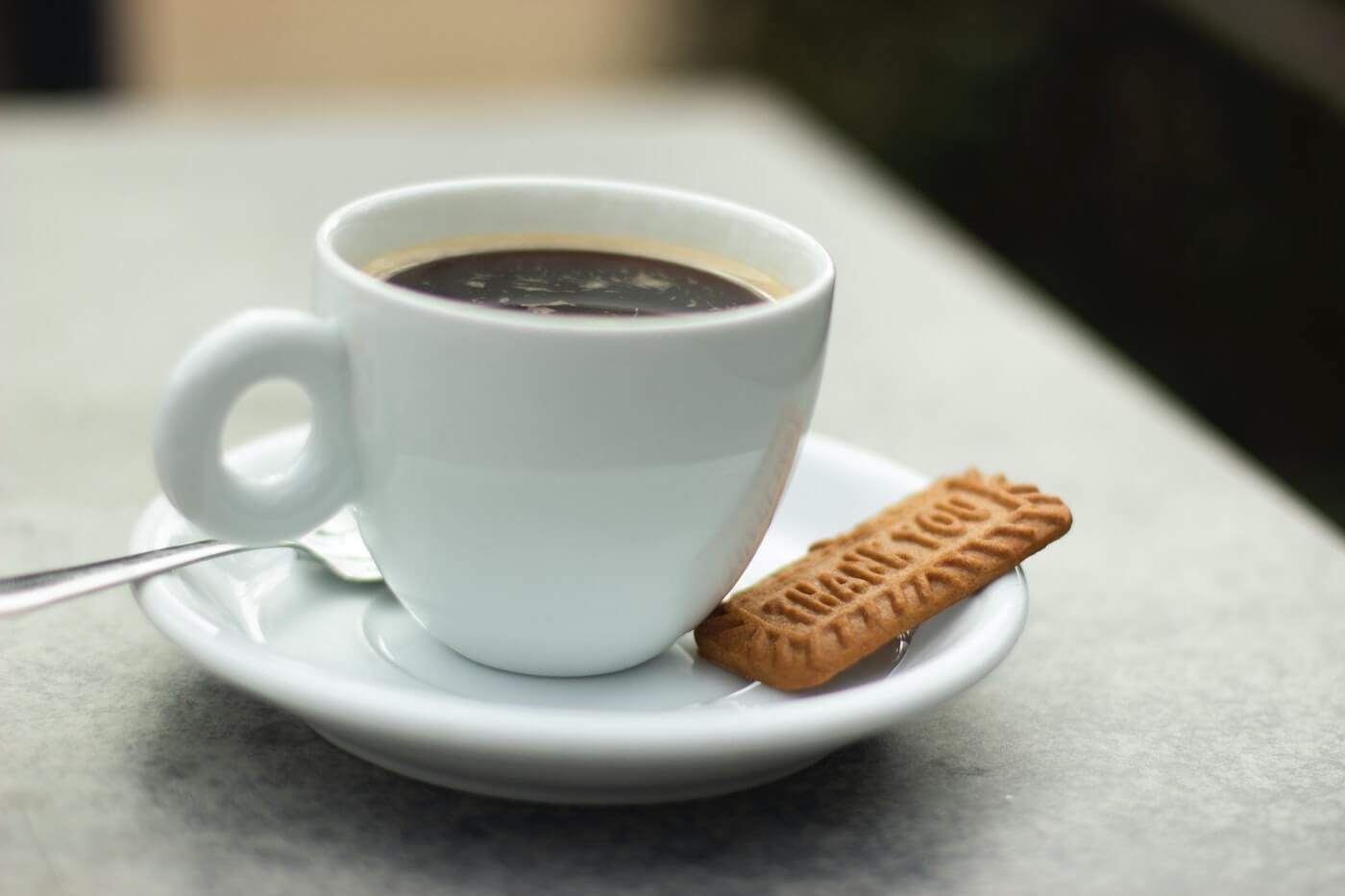 a coffee and biscuit in a cafe