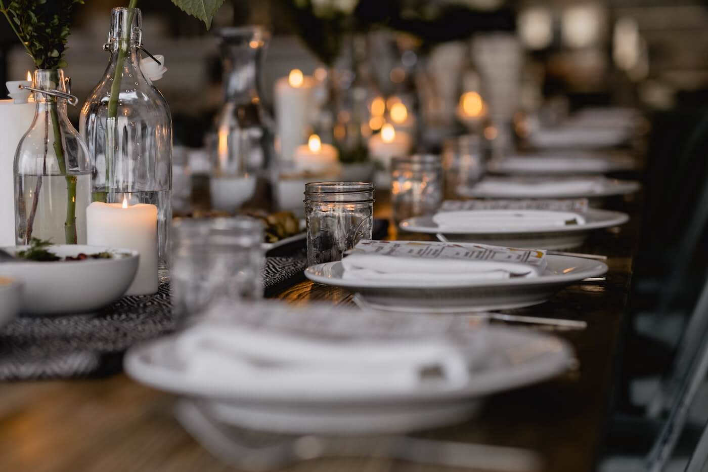 a table set for a rustic dinner party