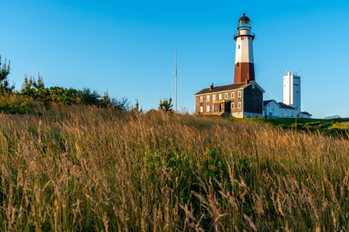 tall grass and historic lighthouse in Montauk Long Island New York