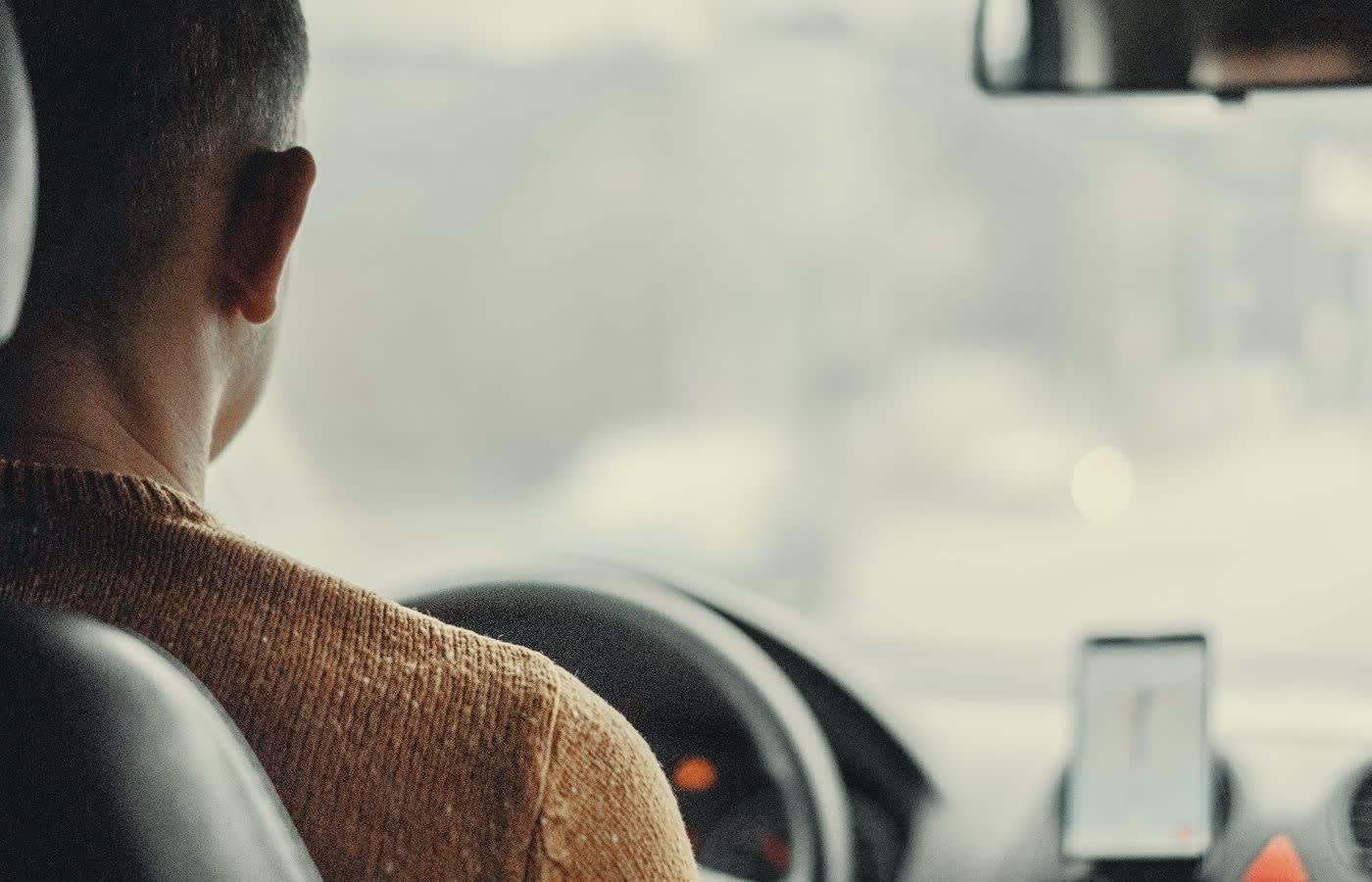 A man driving a rideshare car in chicago
