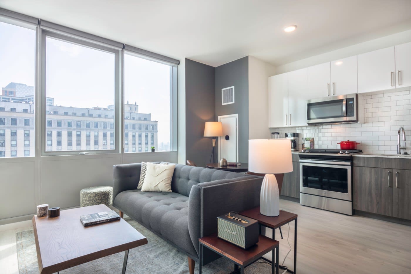 modern kitchenette with white tile backsplash