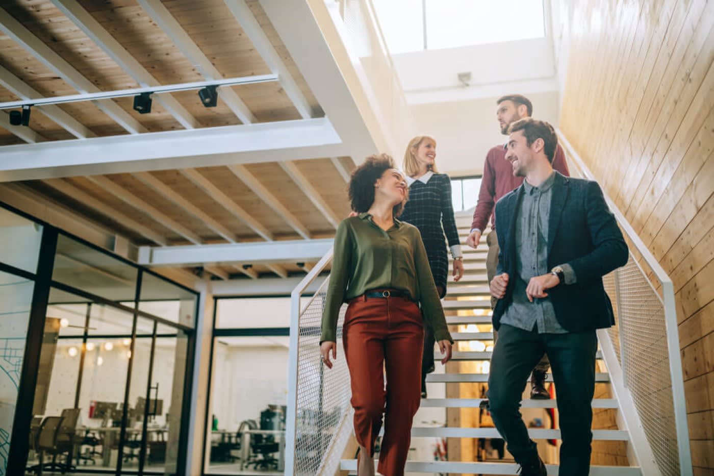 group of colleagues walking down the stairs