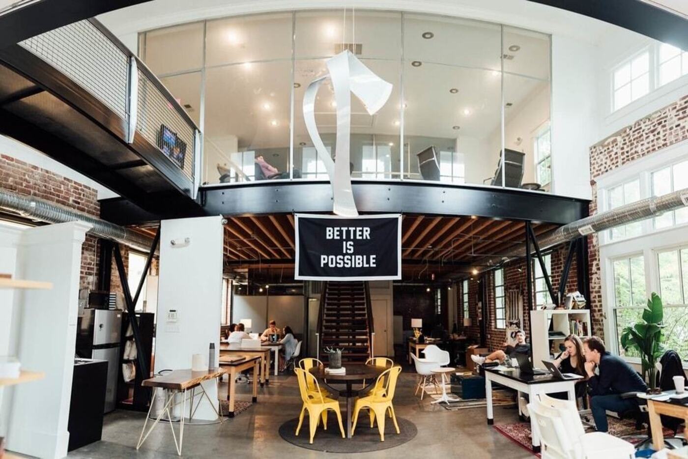 a modern co-working space interior with people working