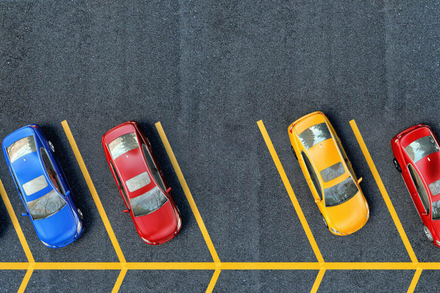 Top view of 2 red, blue and yellow cars parked