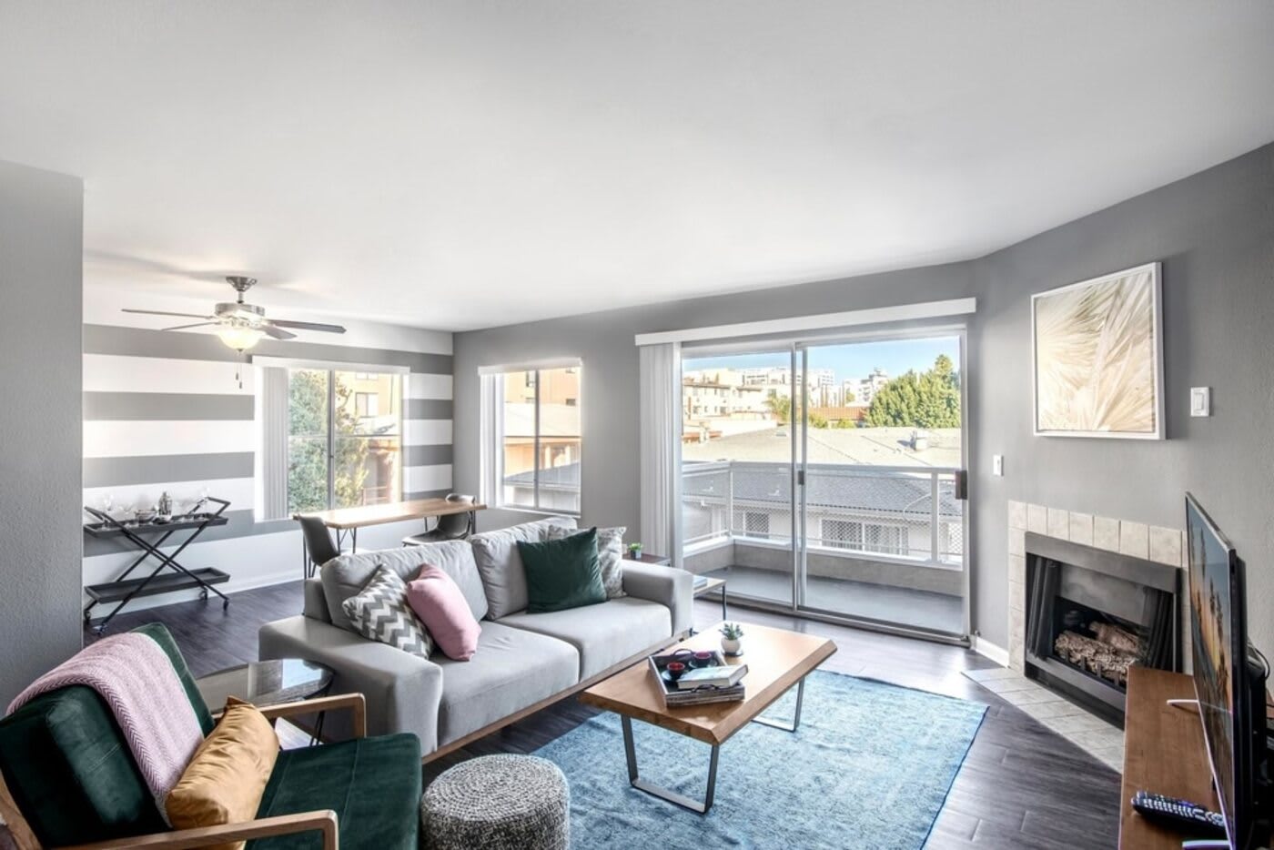 blueprint blueground short term rental los angeles living room grey color scheme grey couch with utilities cart against wall