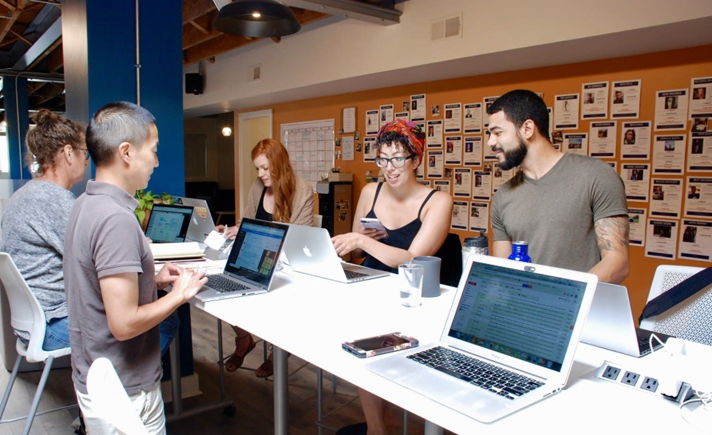 coworking space chicago second shift entrepreneurs at standing desk
