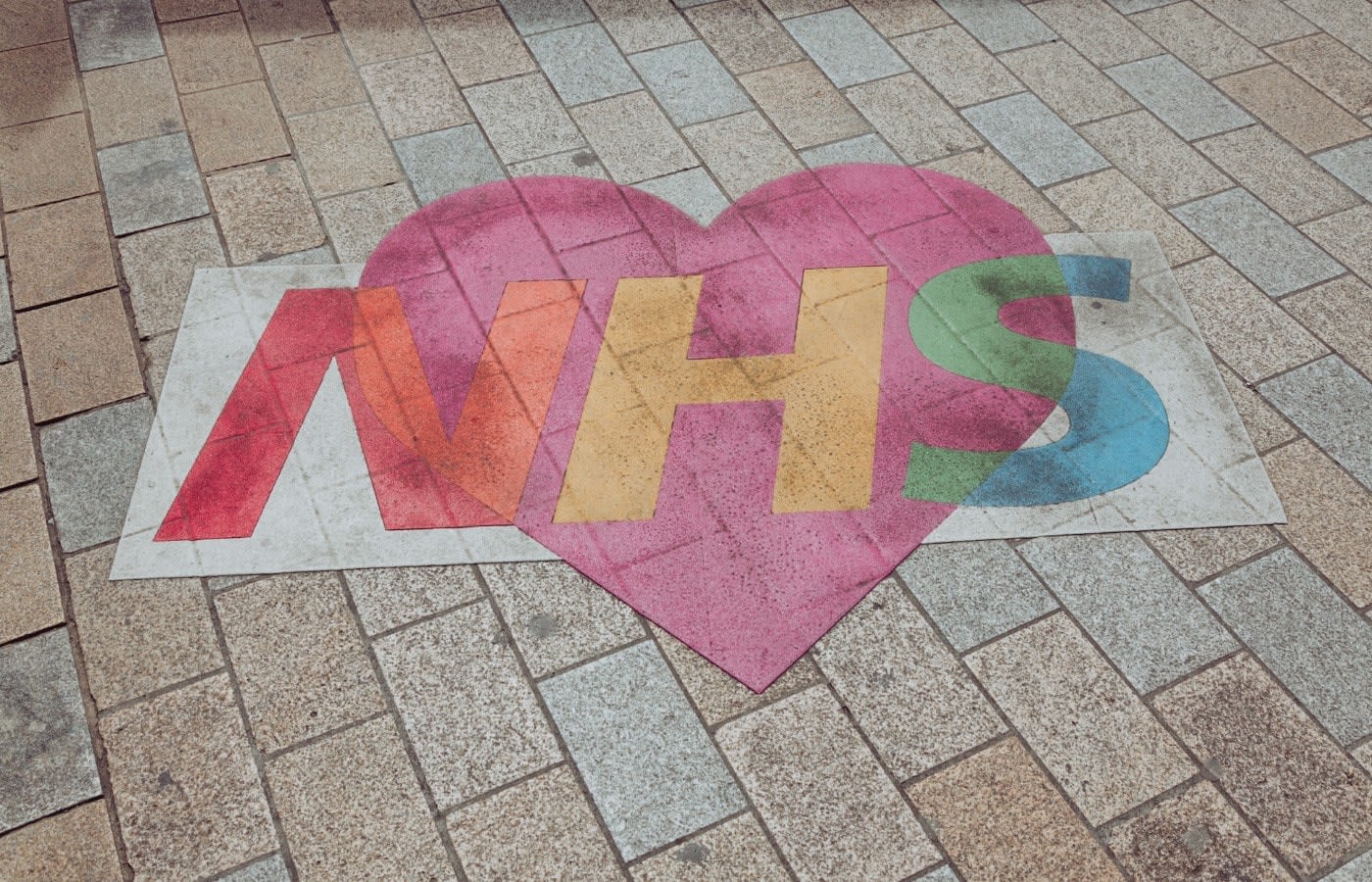 NHS logo inside a heart