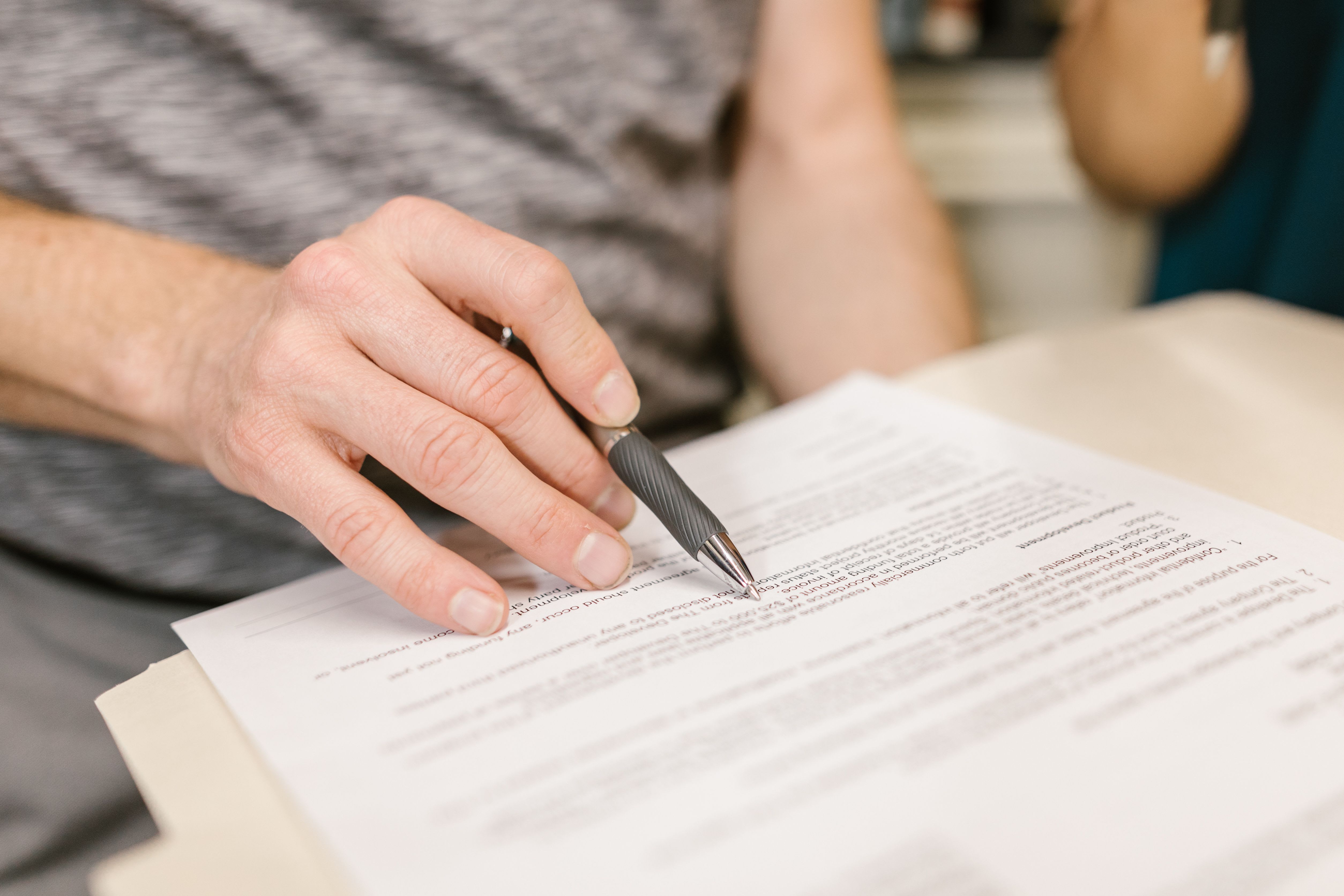 person reviewing rental agreement
