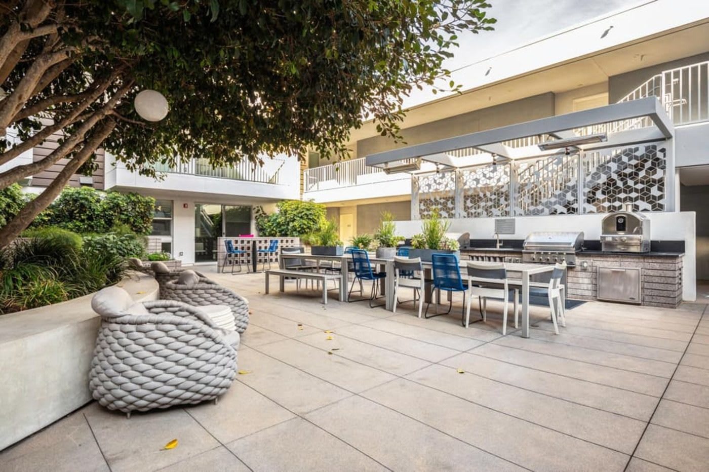 outdoor patio common building area with grills