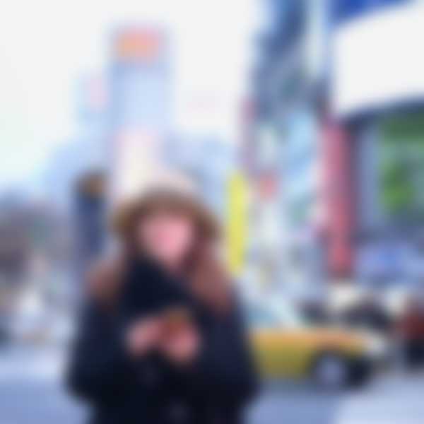 Woman holding phone in Tokyo Japan