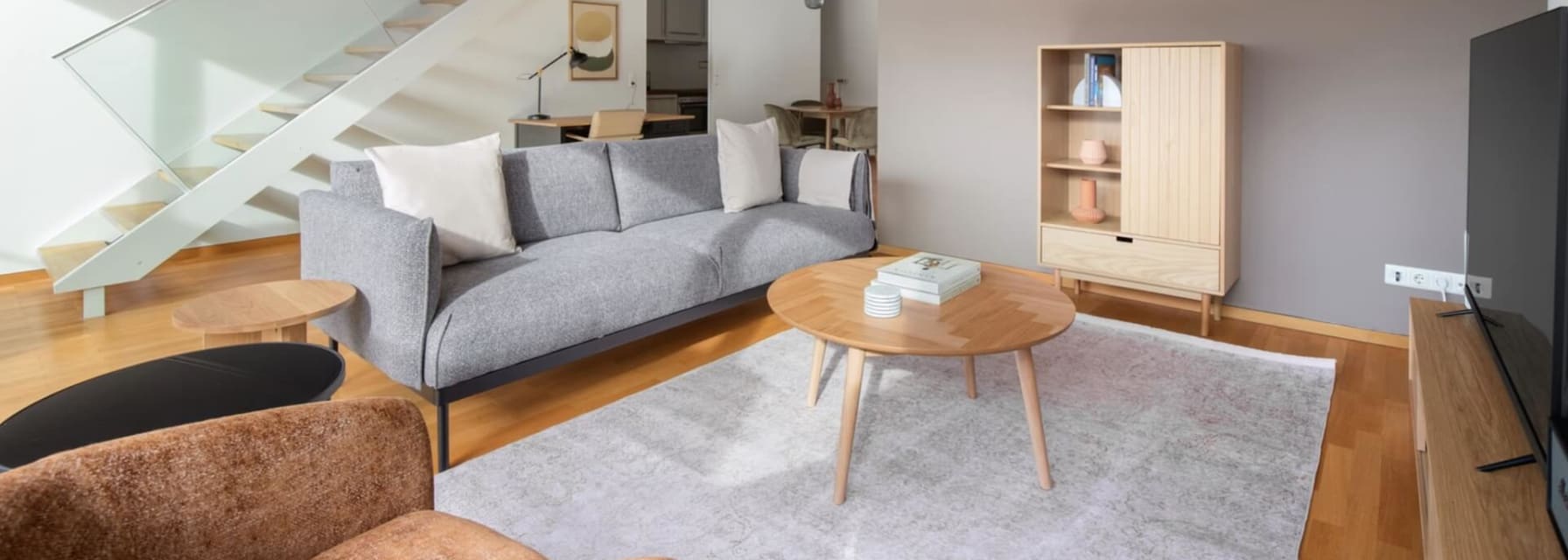 Living room of an open Blueground apartment in Paris