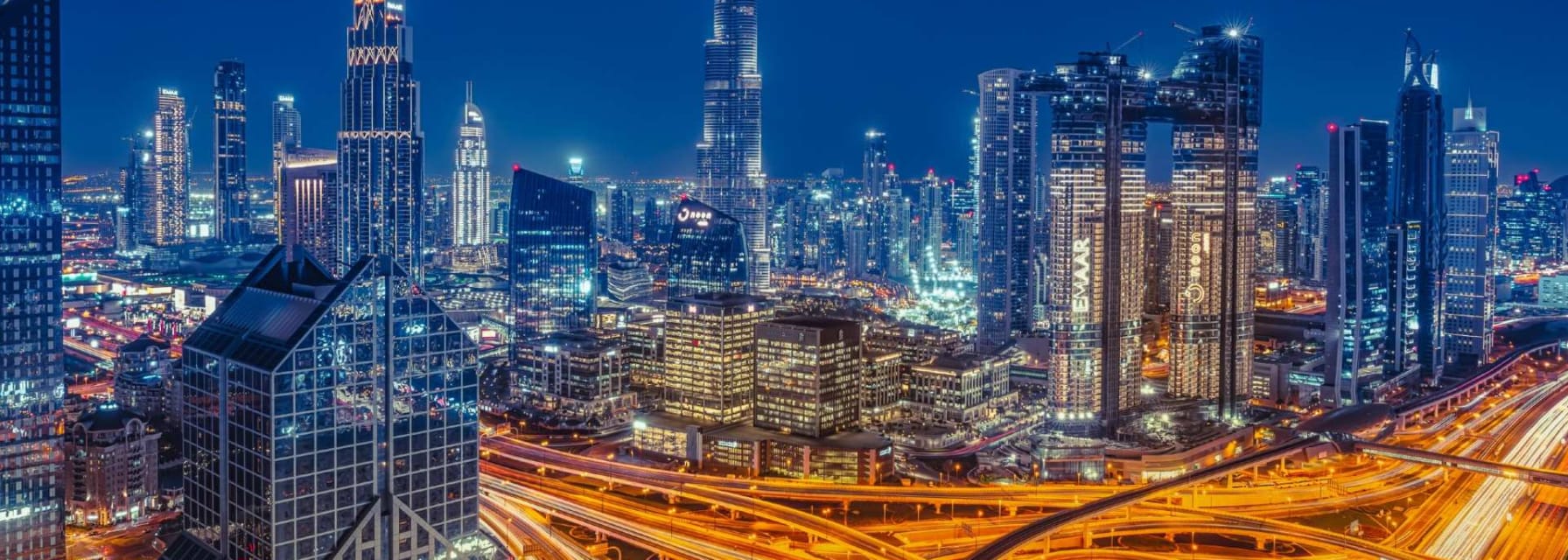 Dubai skyline at night lit up