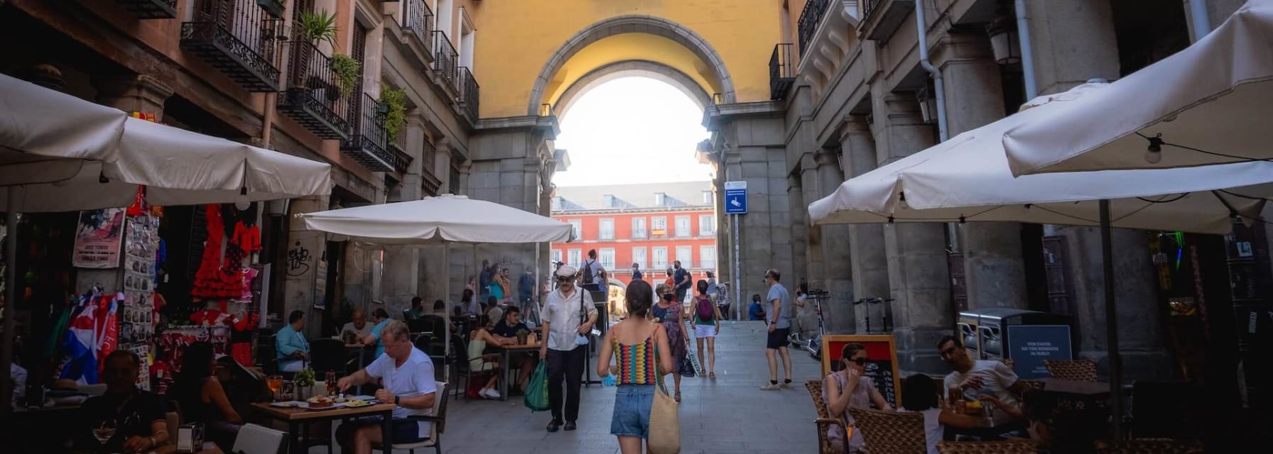 strolling through the plaza mayor in madrid