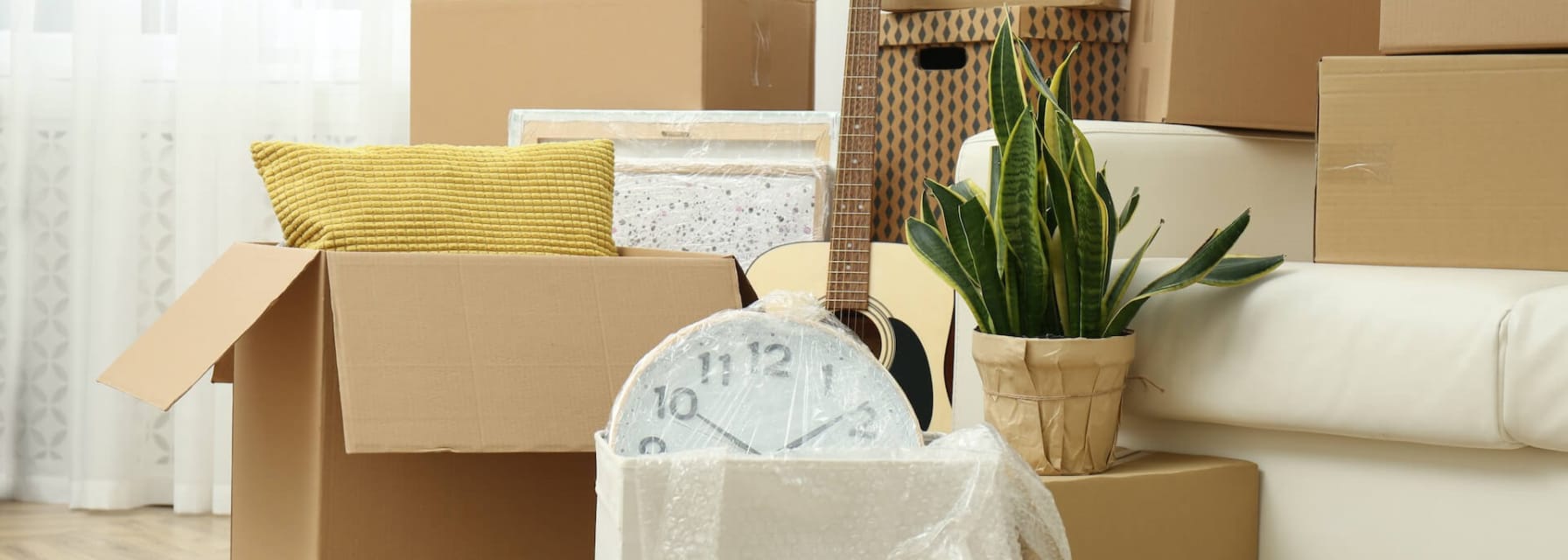 a pile of boxes in a new home