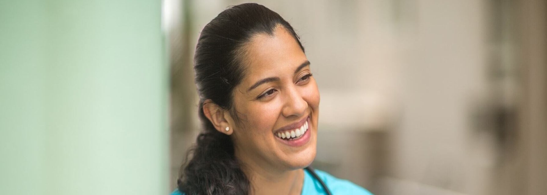 female travel nurse using an IPad