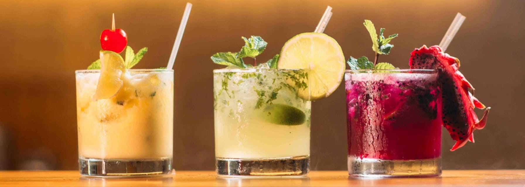 Three colorful cocktails