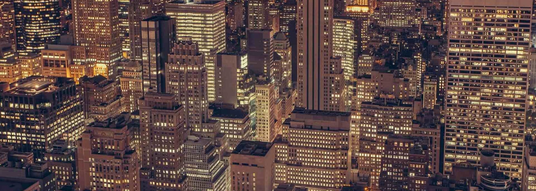 extended stay hotels NYC skyline at night