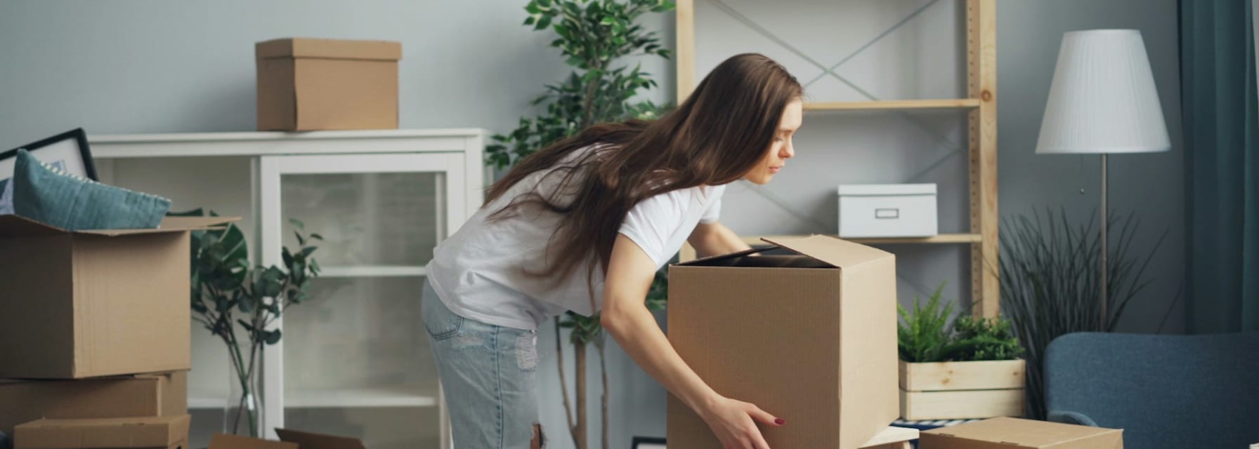 woman packing to move