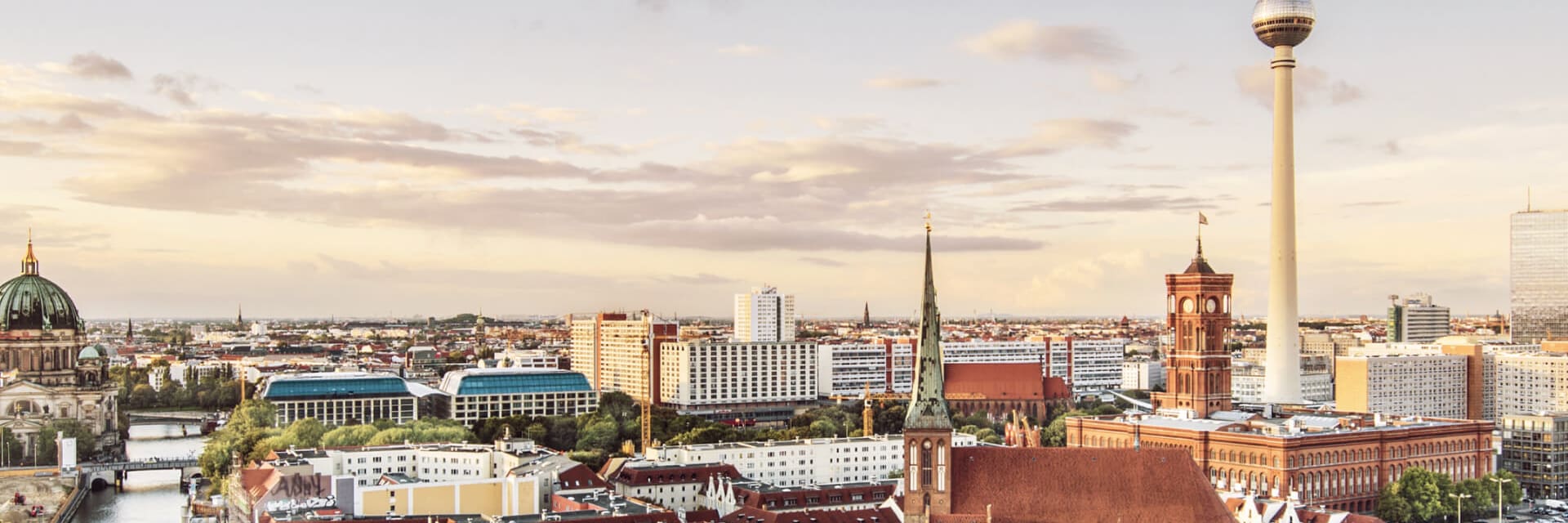 A wide view of the skyline in central Berlin with the Berlin TV tower seen in the left.