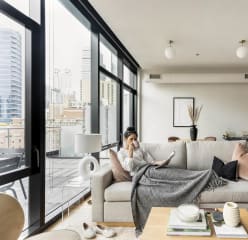 a woman reads a magazine