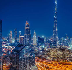 Dubai skyline at night lit up