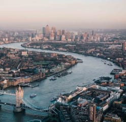 the london skyline with london bridge in the forefront