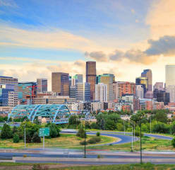 denver skyline with a beautiful blue/golden sky