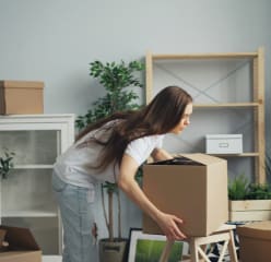 woman packing to move