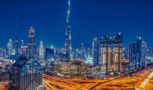 Dubai skyline at night lit up