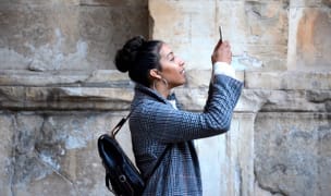 a French woman uses the Blueground app to book an apartment