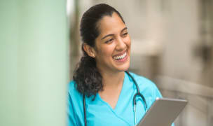 female travel nurse using an IPad