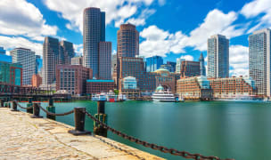 Port in Boston city with skyscrapers in the background.