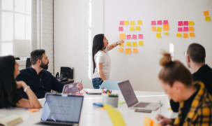 a manager leads a brainstorming session