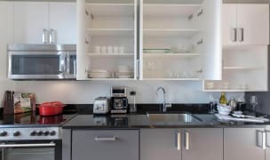 apartment appliances Blueground fully equipped kitchen cupboards and countertops