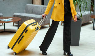 woman traveling with a suitcase